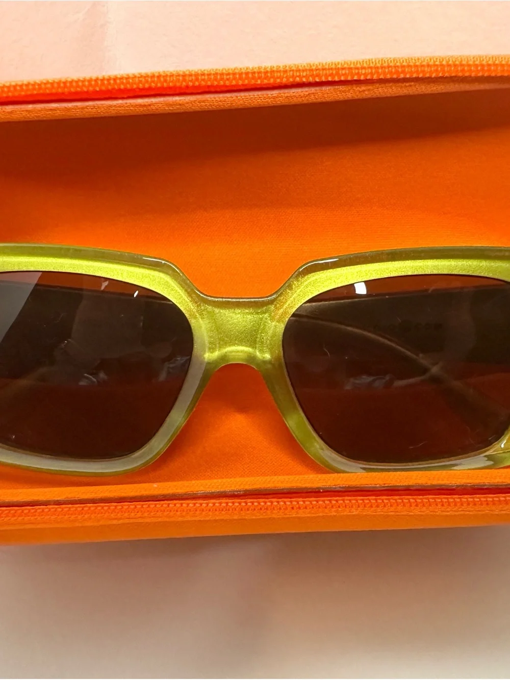 Max Studio Green Transparent Frame Sunglasses with Brown Lenses and Orange Case